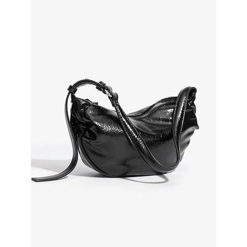 Black pleated dumpling-shaped PU shoulder bag with three-dimensional outer pocket and rock-and-roll style