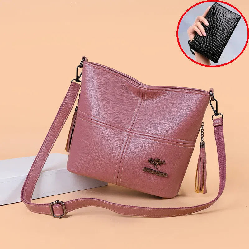 PU crossbody bag in red with stitching and tassels, horizontal shape, large capacity