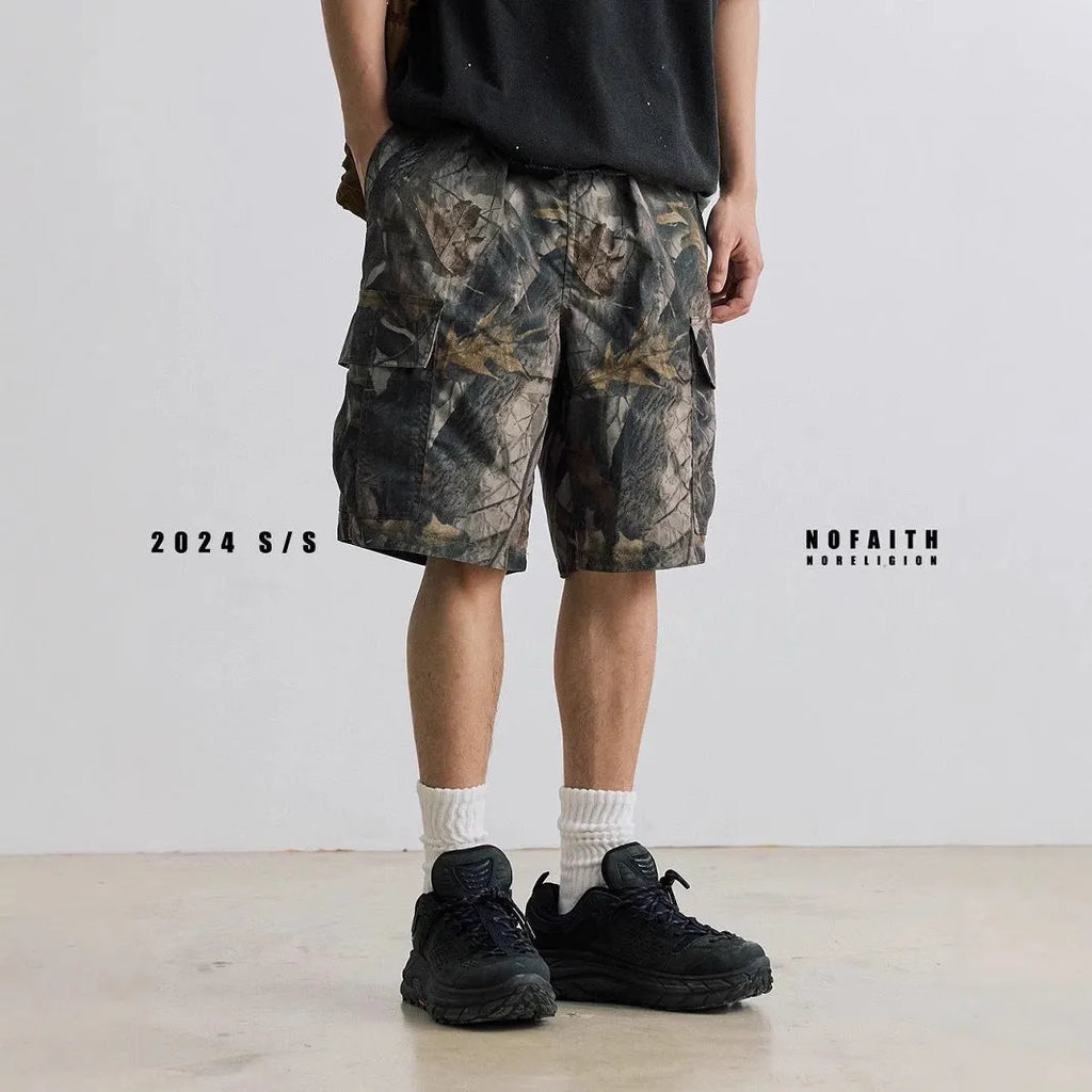 Men's loose fit denim shorts in army green with an elasticated waistband and straight leg.
