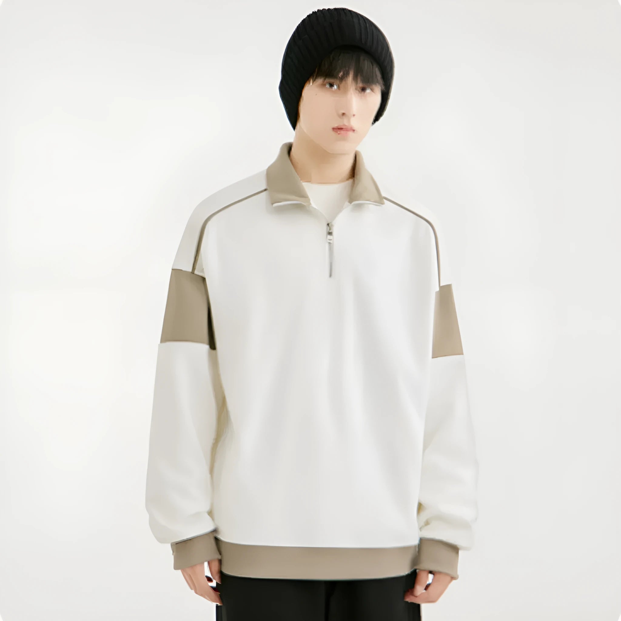Men's grey hooded corduroy sweater with drop shoulders and loose lapels on a hanger