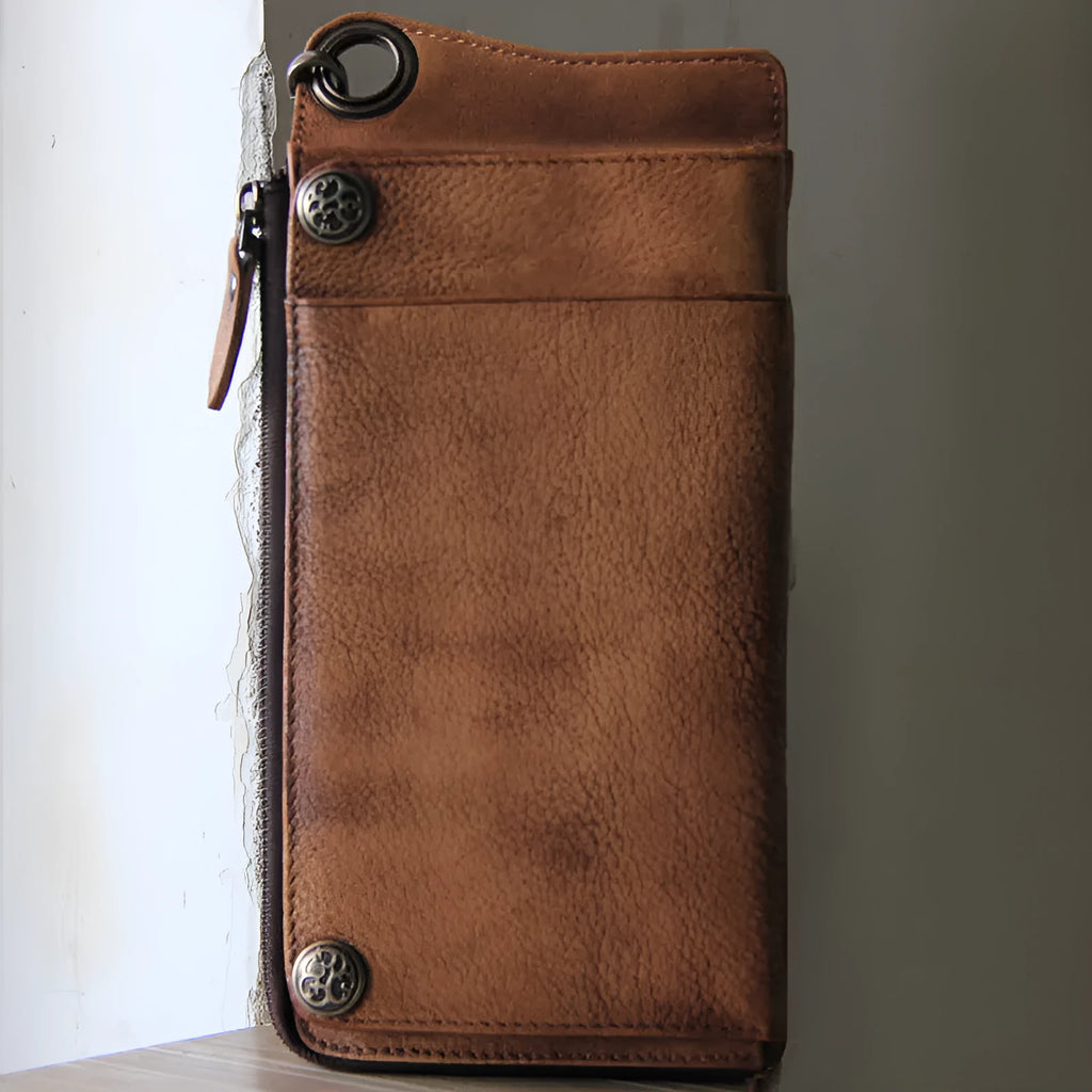 Retro long cowhide wallet with 13 card slots, zipper bill pocket, in bark brown, on flat surface