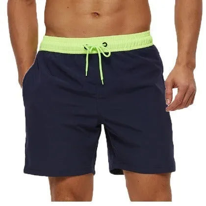 Men's blue running shorts with zipper pocket and drawstring waist detail for fitness activities