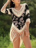 Women's apricot V-neck sun protection shirt with hollow-out loose sleeves on a mannequin.