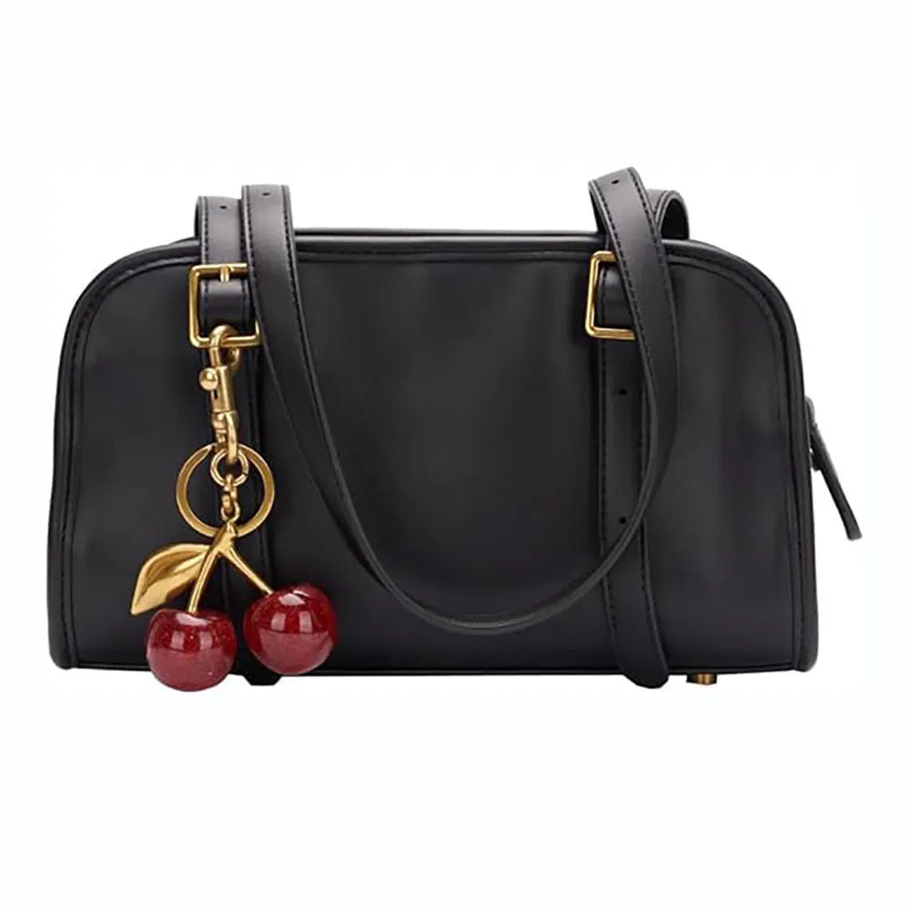 Red zinc alloy 3D cherry keychain pendant with metal loop for keyring attachment.
