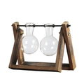 Glass plant terrarium with wooden stand, geometric shape, Chinese style, on a desk