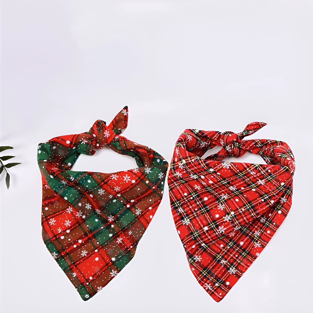 Cotton triangular dog scarf with plaid pattern in Christmas colours, 44x44cm, placed on a dog
