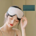 Portable eye spa mask with steam heating and vibration massage functions in green colour