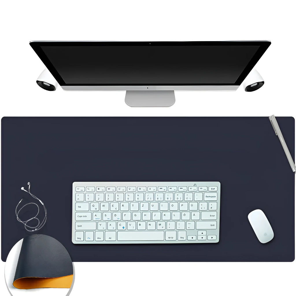Leather desk mat in grey on a desk with keyboard and mouse