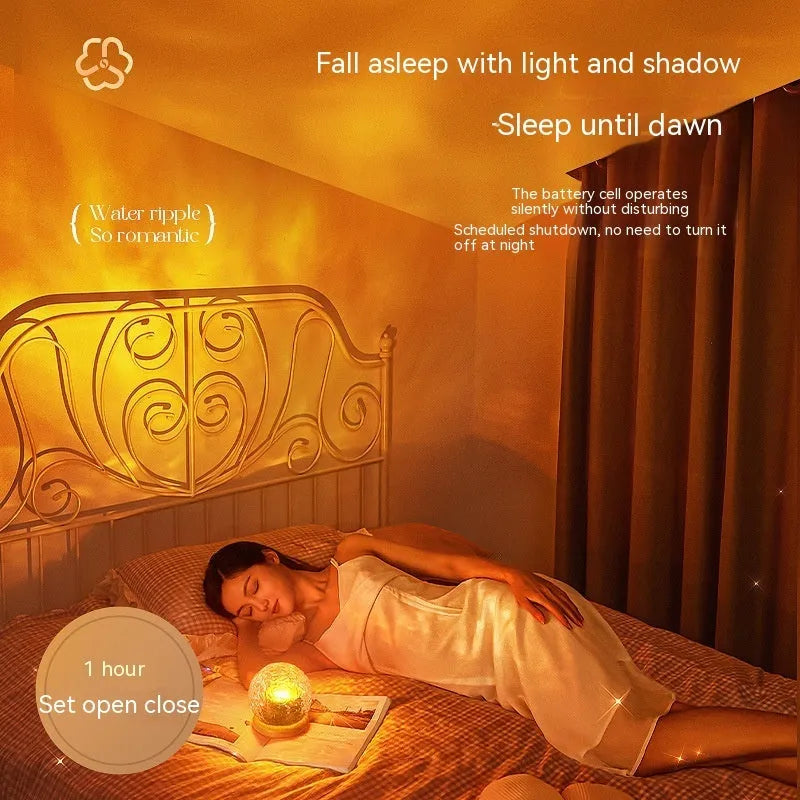 Projector night lamp with water ripple effect and remote control on a bedside table