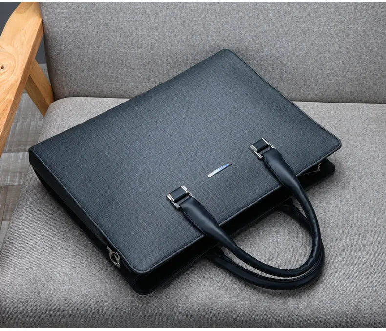 One-shoulder cross-slung male business briefcase in black PU leather horizontal square shape with stitching detail