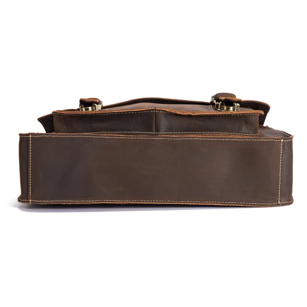 Men's handbag in dark brown coffee first layer crazy horseskin leather, shown as a shoulder bag on a model.
