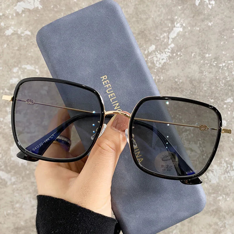 Photochromic myopia glasses with large frame, anti-blue light lens, and Black Gold frame colour options