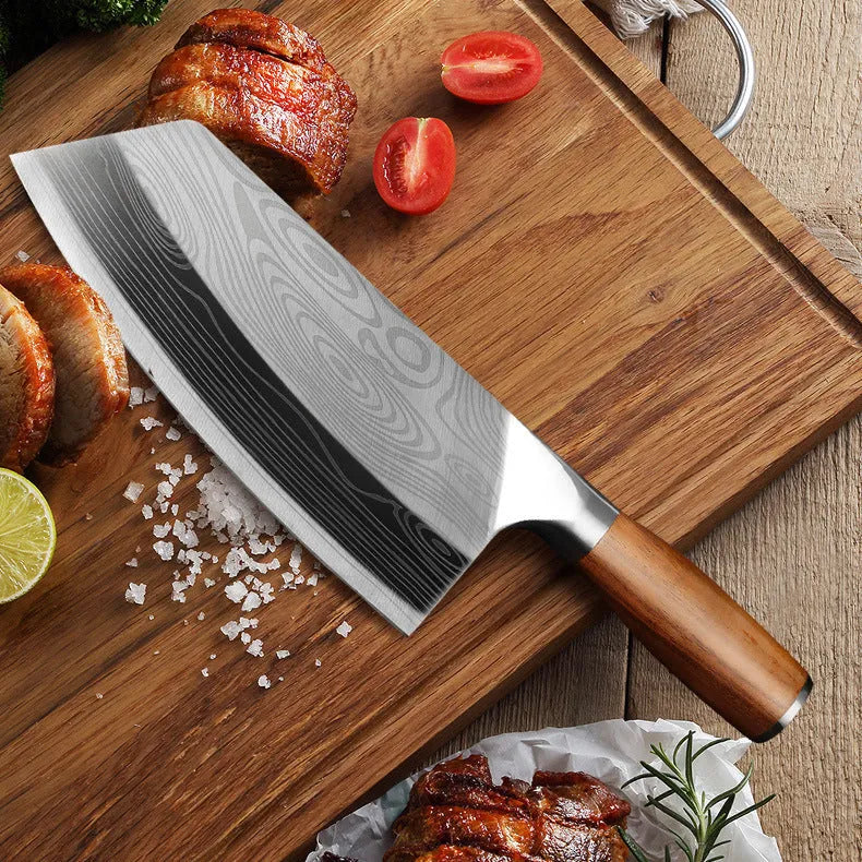 Stainless steel kitchen knife with a 320mm forged blade on a cutting board.