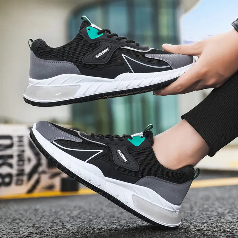 Colour-blocked men's mesh trainers with rubber sole, front lace-up, flat heel, round toe, in Black Green, Black Orange, or Grey Orange.