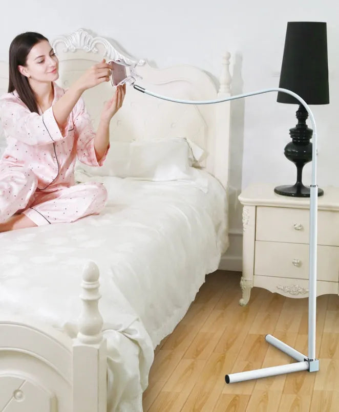 Black mobile phone bed bracket with adjustable overhead arm holding smartphone