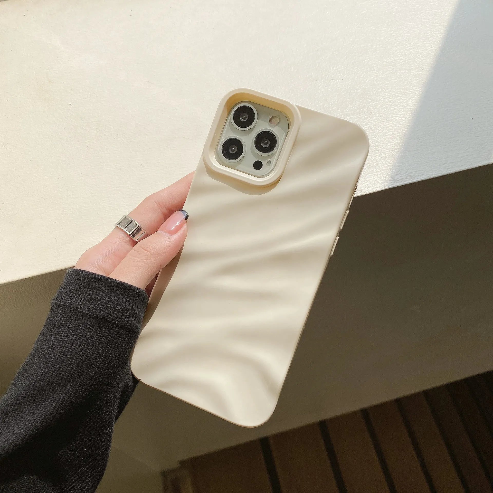 Soft wave pleated TPU phone case for Apple iPhone 17 in a selection of colours including electroplated gold and matte purple.
