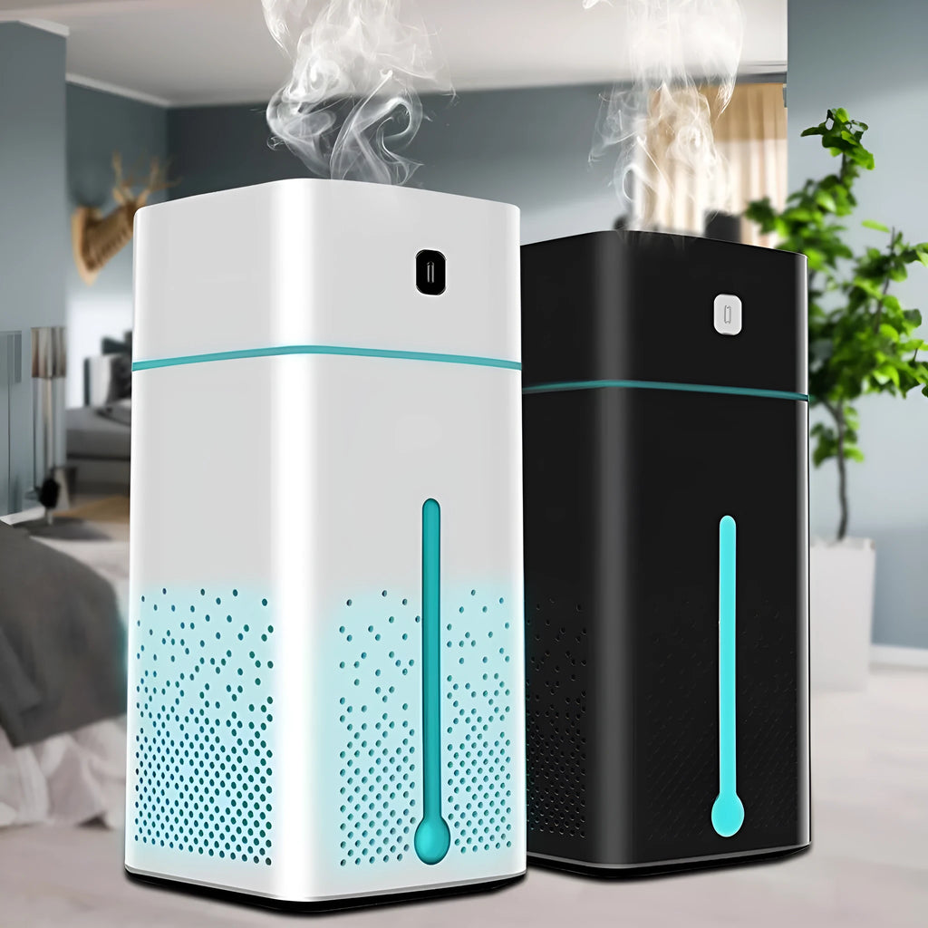 Black and white USB-powered desktop humidifier with 1000ml water tank on a desk.