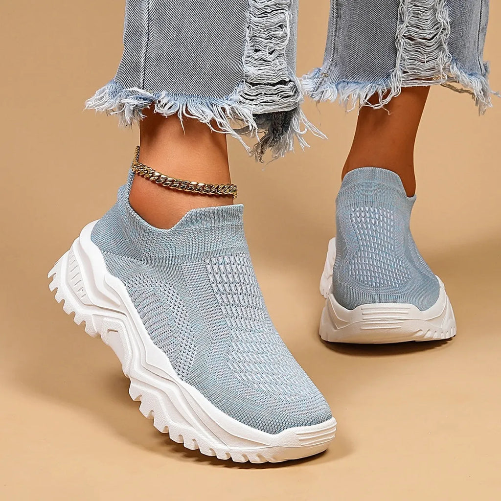 Women's light blue mesh slip-on casual shoes with round toe design