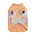Dog wearing a colourful rainbow circle pattern sweater made from a soft wool acrylic blend.