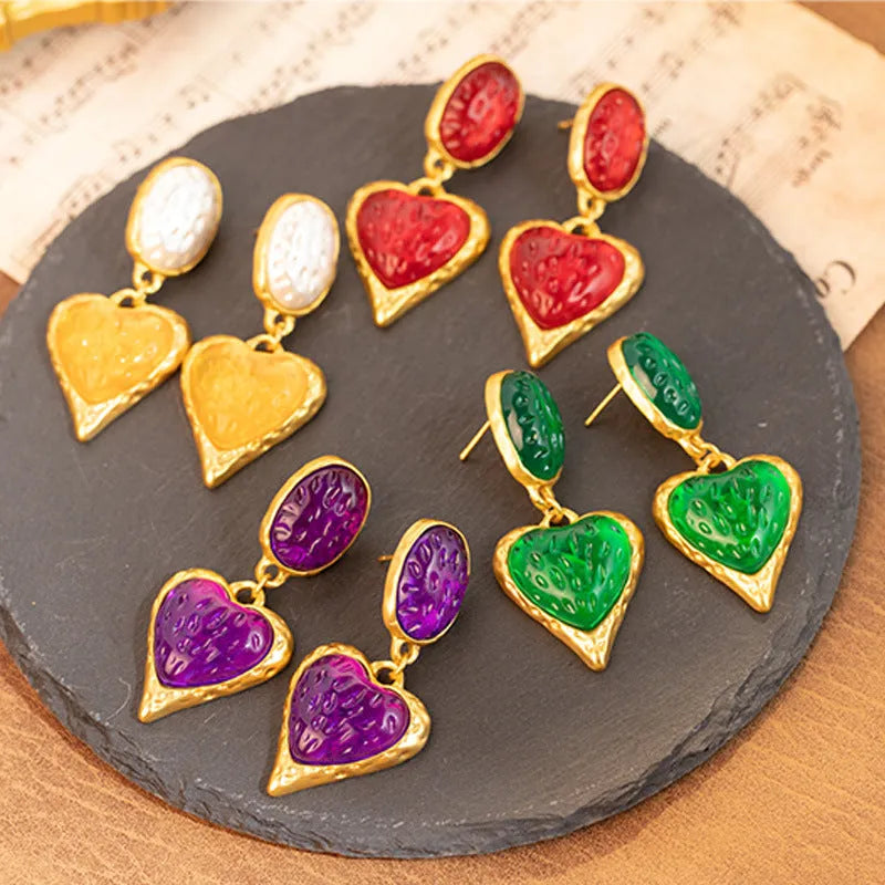Silver needle pleated oval love heart stud earrings in purple, red, green, and yellow white colour options.