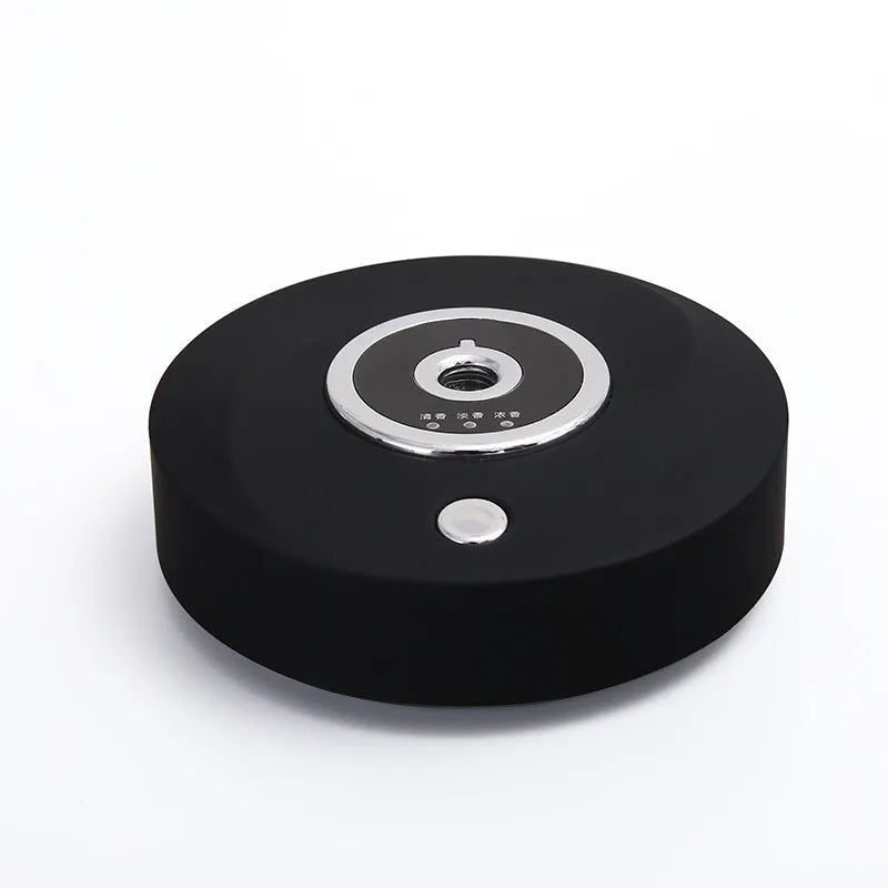 USB car aromatherapy machine in black, grey, or white with anti-slip pad on dashboard