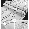 Curve Stripe 3D textured wallpaper roll showing close-up of light grey velvet geometric pattern