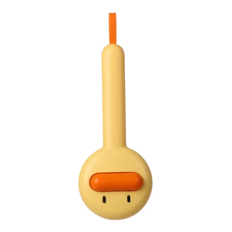 Small yellow duck comb with needle pins for pet hair removal on cats and dogs