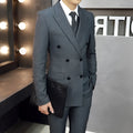 Men's black three-piece suit set with jacket, vest, and trousers, slim fit, anti-wrinkle fabric, on a mannequin.