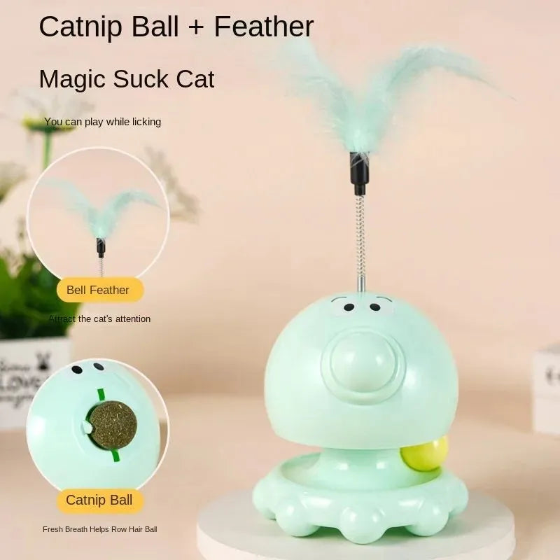 Cat food dispensing turntable toy in green with stick, plastic construction, for indoor cats
