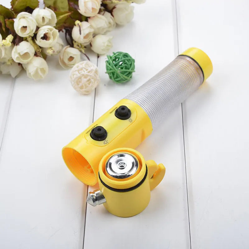 Car emergency tool with LED torch, magnetic beacon light, belt cutter, and window hammer on black background