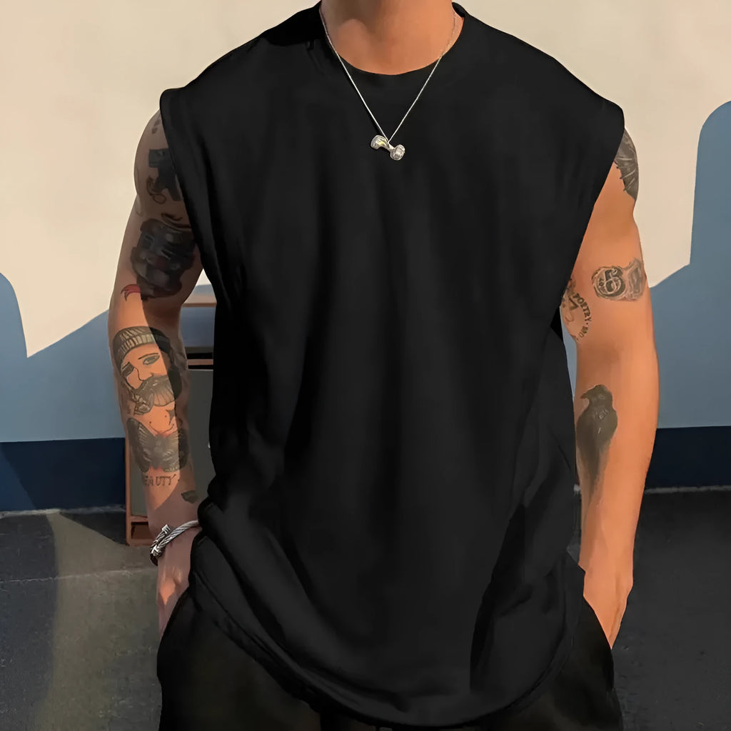 Men's loose fit solid colour cotton tank top on a hanger