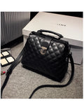 Genuine leather retro doctor bag in black with top handle and shoulder strap