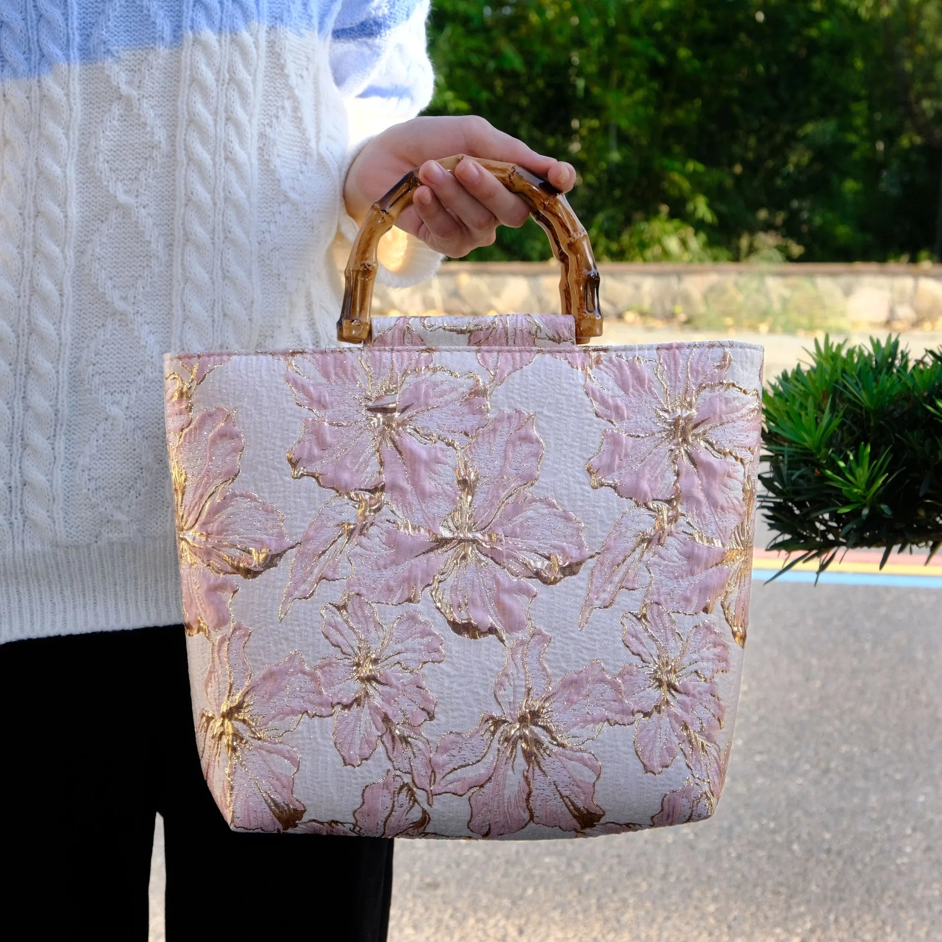 Light blue women's canvas bag with bronzing flower detail and double shoulder straps