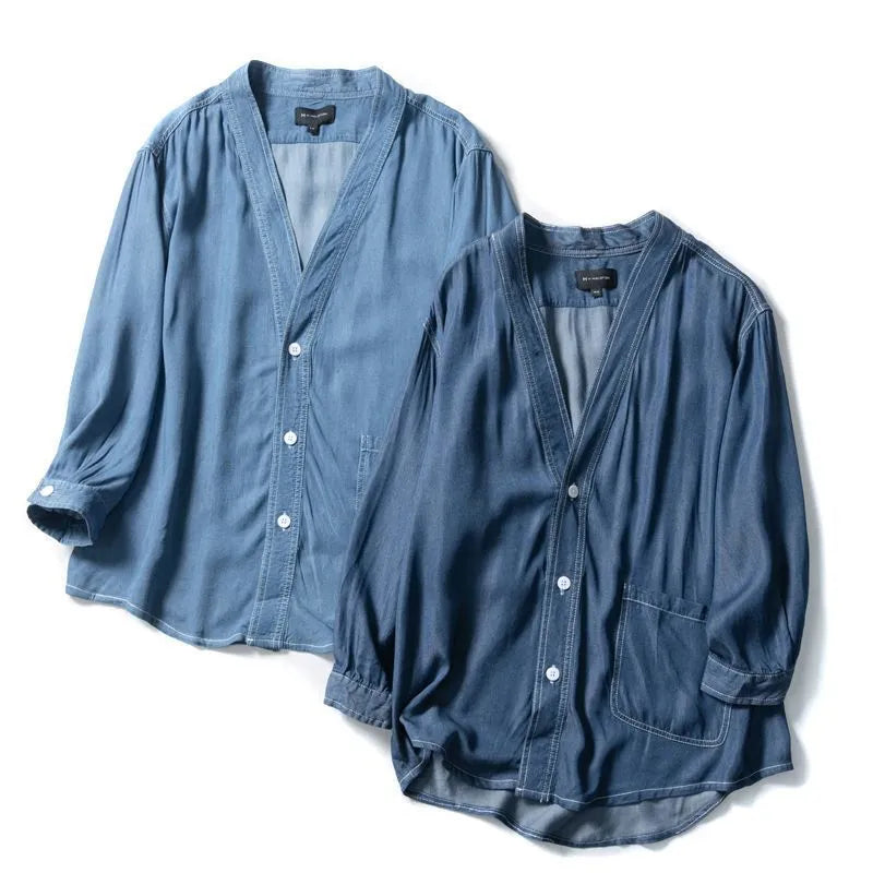 Men's dark blue casual denim coat with three-quarter sleeves and a V-neck collar.