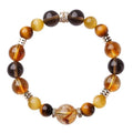 Lucky Jinba natural tiger-eye crystal bracelet with geometric beads in yellow tower style.
