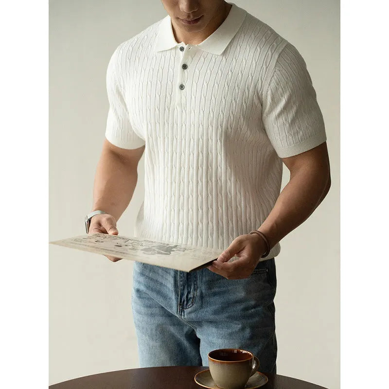 Men's khaki short sleeve business top on a hanger, showing the collar and button placket.