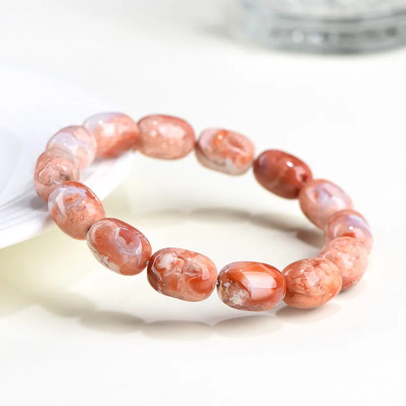 Natural cherry agate barrel bead bracelet with geometric shape and ruyi design elements