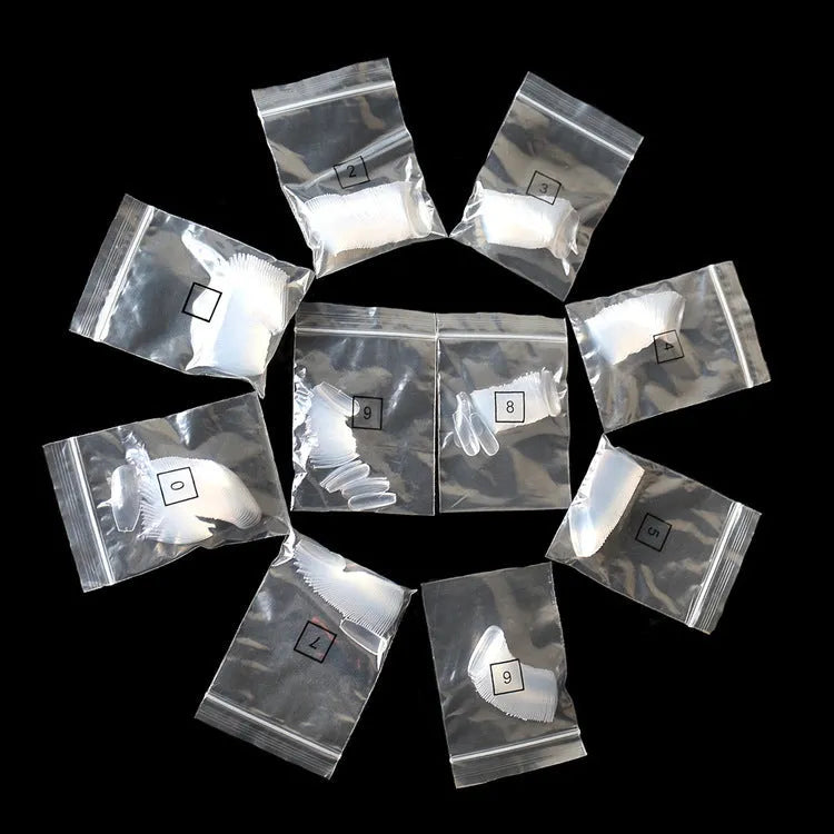 500 transparent natural ABS artificial fake nails in 10 sizes for professional and home nail art.