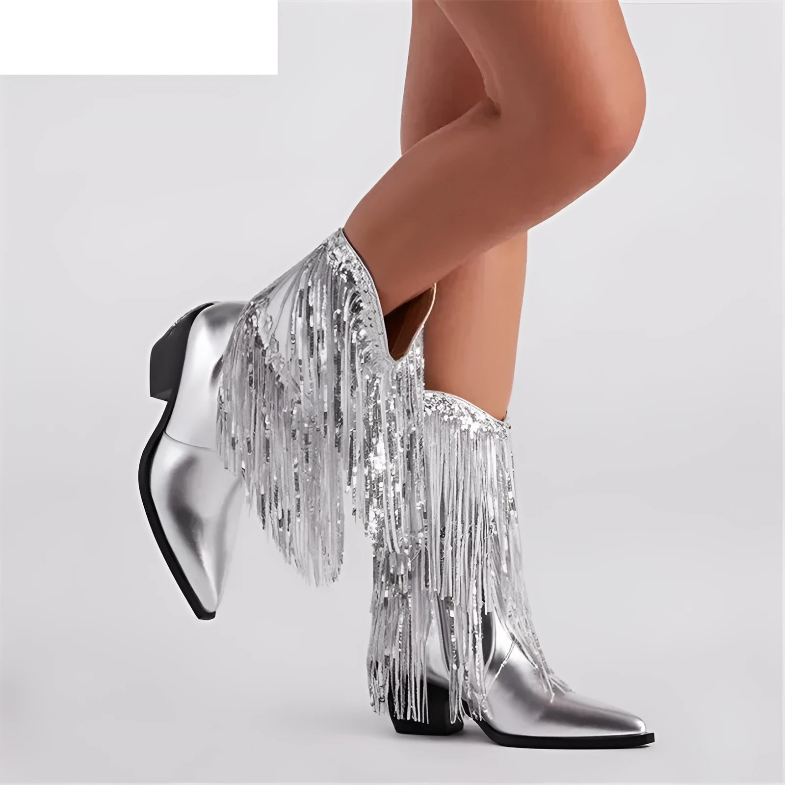 Women's black chunky heel ankle boots with tassel detail and pointed toe on a stiletto heel.