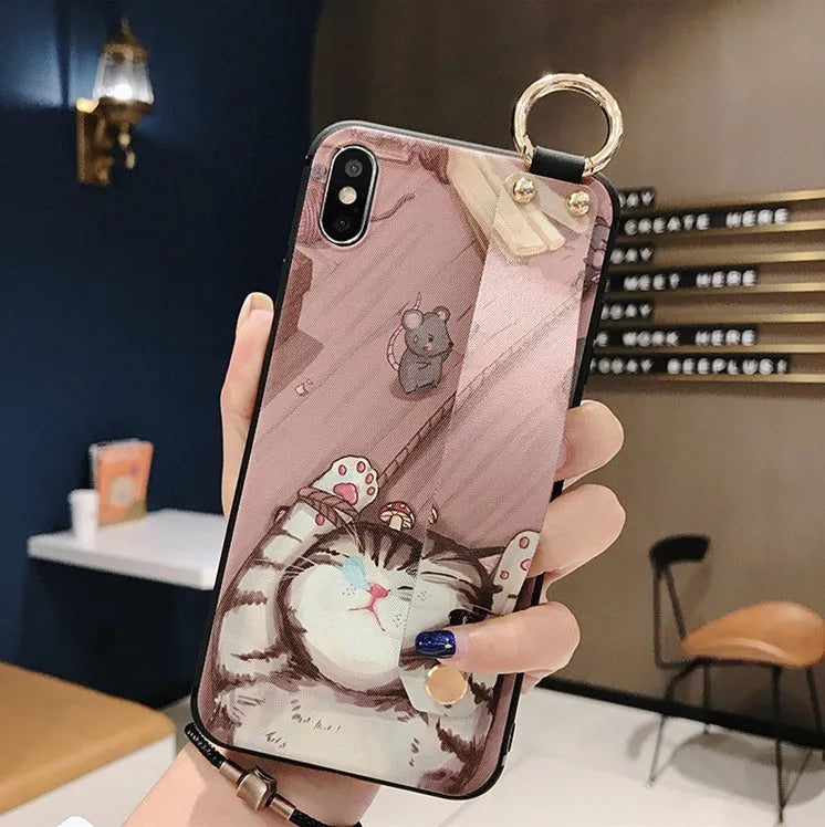 Rose floral pattern iPhone case with a built-in wrist strap, shown on a phone.