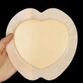 Large skin tone silicone bedsore dressing for pressure sore relief.