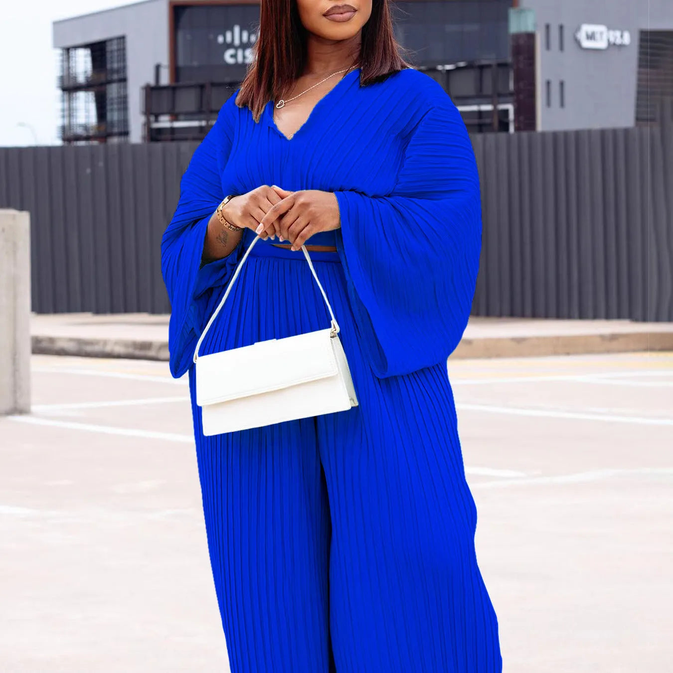 Women's sapphire blue African suit two-piece set with batwing sleeves and wide-leg trousers