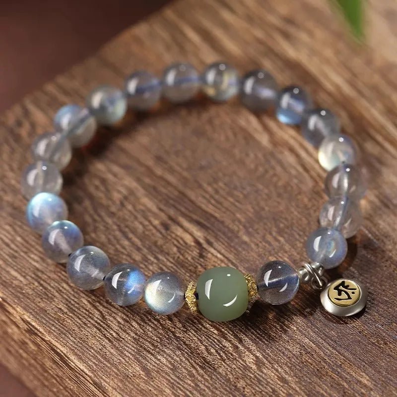 Birth Buddha Beads moonstone bracelet with 8mm beads featuring Thousand-Hand Kwan-yin mouse design