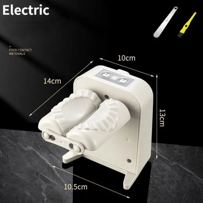 White automatic electric dumpling maker machine with USB charging cable, brush, and spoon on a kitchen counter.