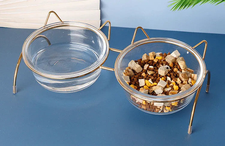Raised glass cat bowl with golden metal rack and non-slip sleeves, 31x15x13.5cm, for pet food or water