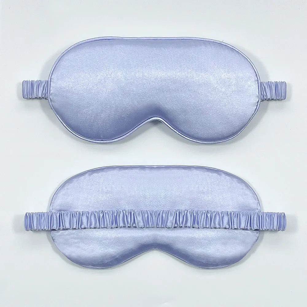 Rayon satin sleep mask in various colours showing double-sided silk-like fabric and elastic strap.