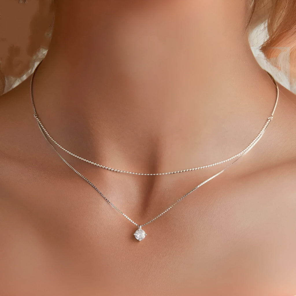 Women's double-layer sterling silver necklace with pearl chain and personality pendant