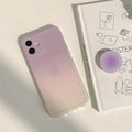 Yellow to purple gradient silicone iPhone case with X bracket pattern and corner airbag protection