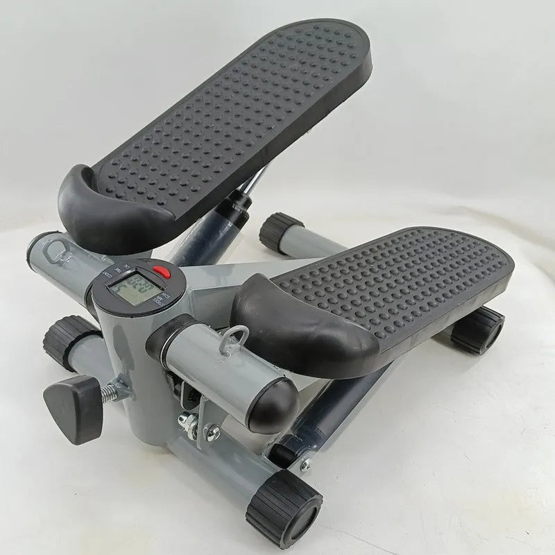 Silver grey hydraulic mini treadmill waist slimming pedal exercise machine for home use.