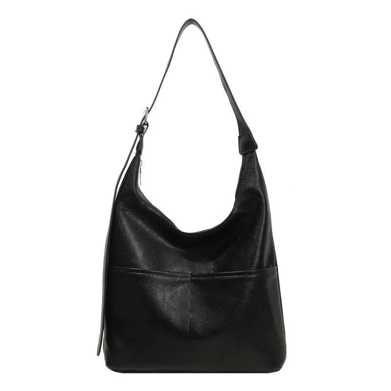 Women's large-capacity shoulder bag in soft PVC with bucket shape and stitching detail, available in black, coffee, brown, mud, beige